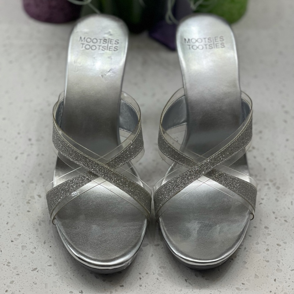 Mootsies Tootsies “Glass Slipper” heels.  Color: Clear/Glitter Silver.  Size 7.5